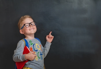 young boy pointing with an idea