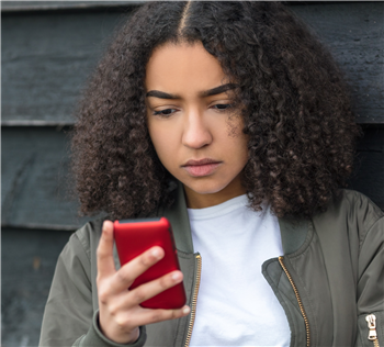 teenager on a mobile phone